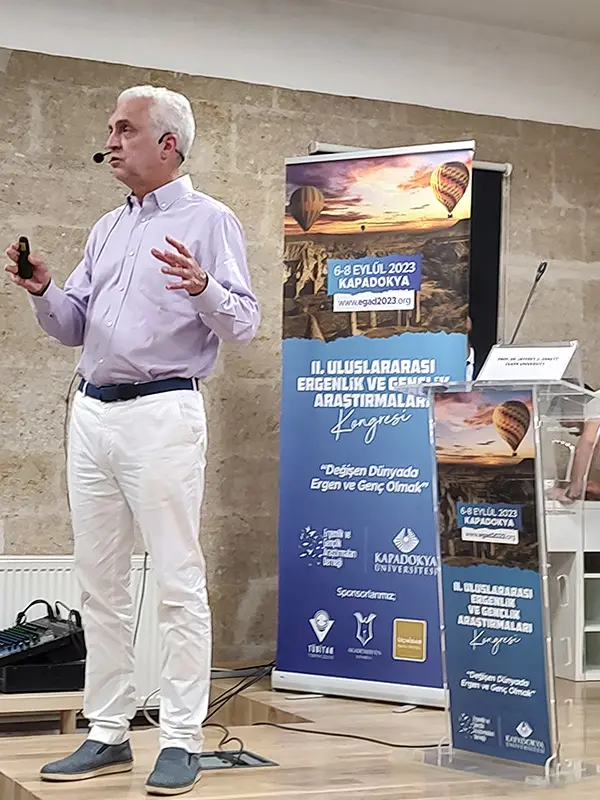 Dr. Arnett speaks during a presentation in Turkey